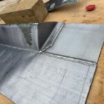 Lead welding chimney flashing